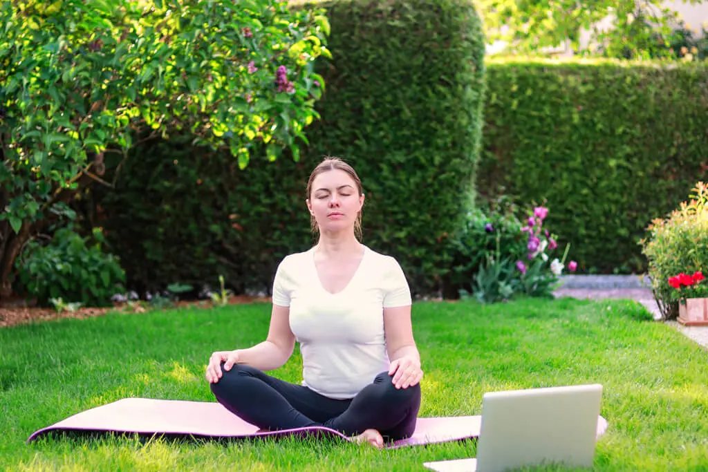 woman practicing guided meditation