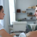 man talking to his partner about drinking