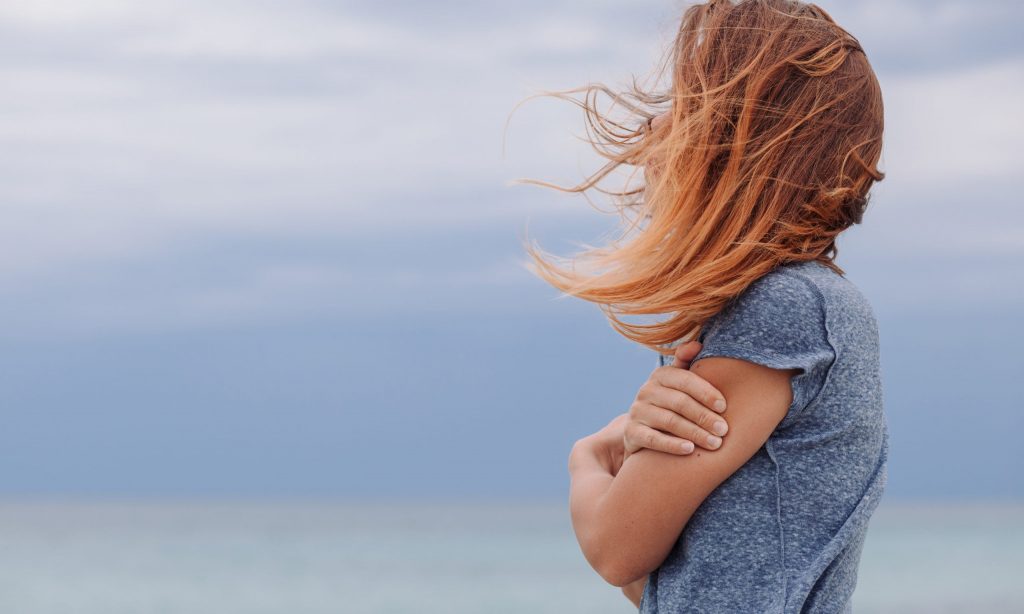 meth addict in recovery looking at the ocean
